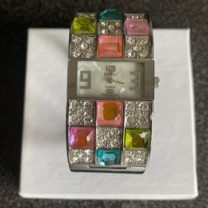 Geneva Silvertone Colorful Rhinestone Cuff Watch.